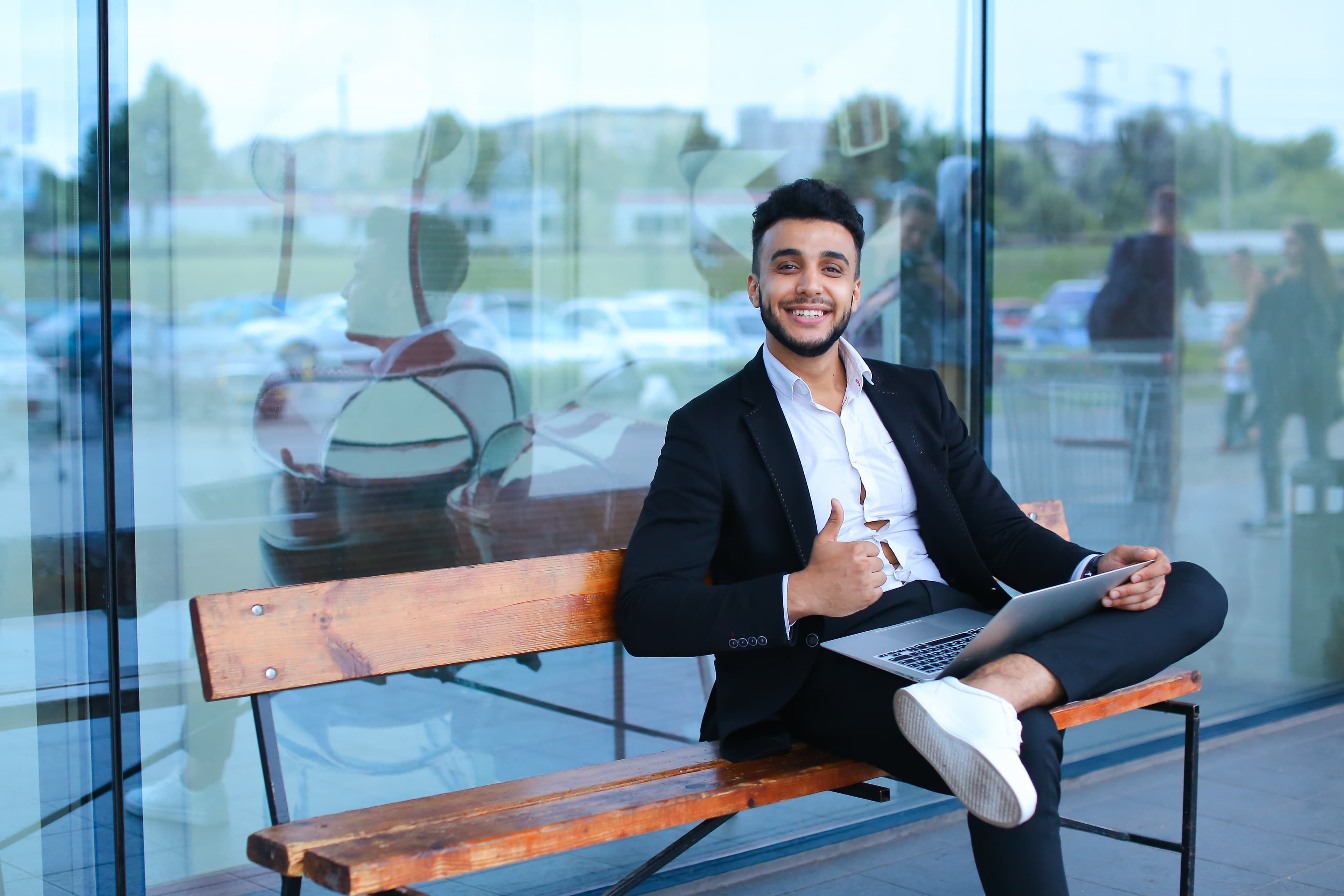 Travel expert ready to help, laptop in hand